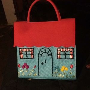 Lulu Guinness  purse with front of a house detail